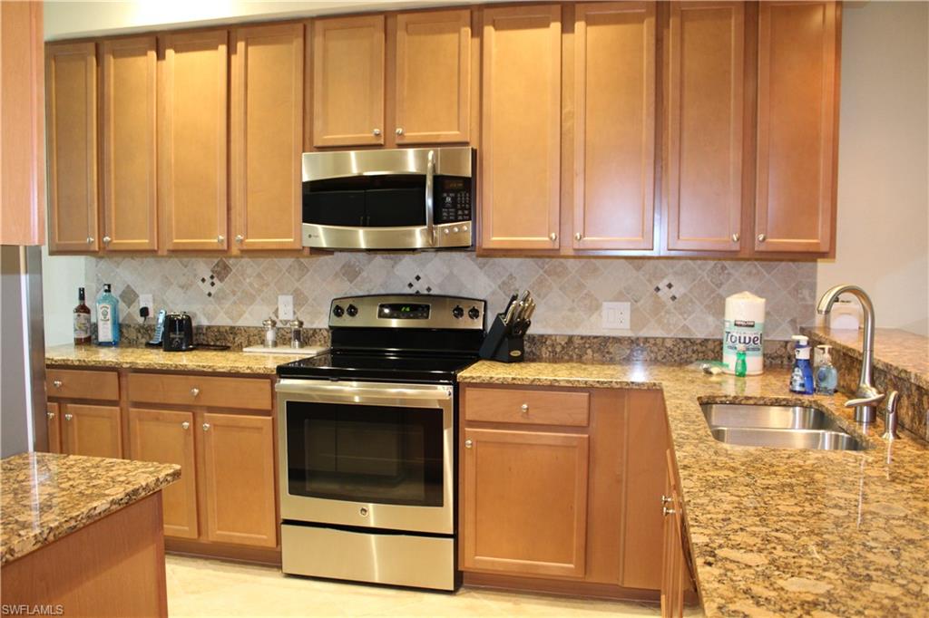 9735 Acqua Court, Unit 611 Naples, FL 34113 - Photo 2 of 30