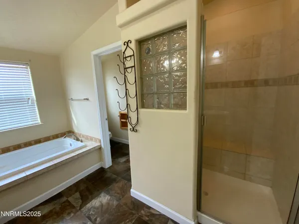 a bathroom with a sink and a shower