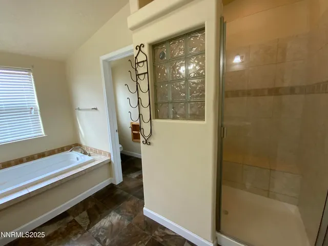 a bathroom with a sink and a shower