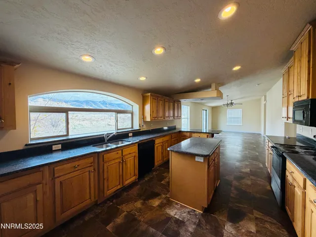 a kitchen with granite countertop lots of counter top space