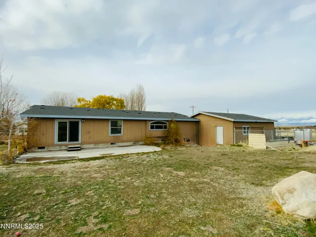 a view of a house with a patio