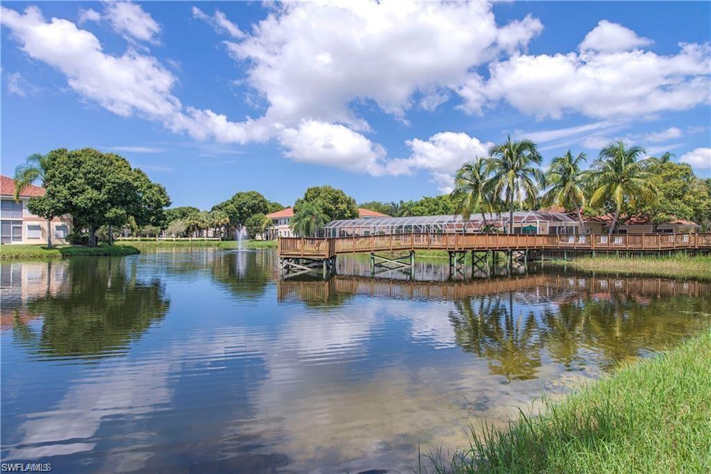 2420 Old Groves Road, Unit 204 Naples, FL 34109 - Photo 11 of 32 Clubhouse/Pier Rear View
