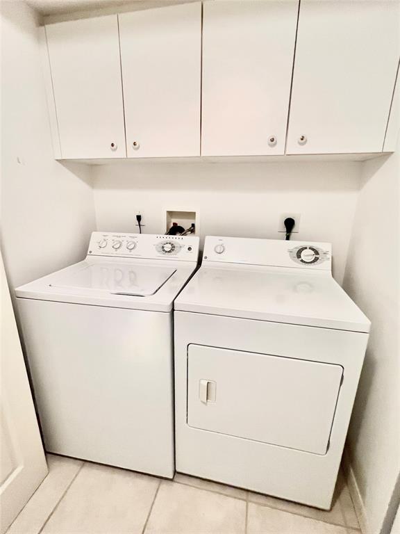 7763 Southampton Terrace, Unit 411 Tamarac, FL 33321 - Photo 15 of 33 a utility room with dryer and washer