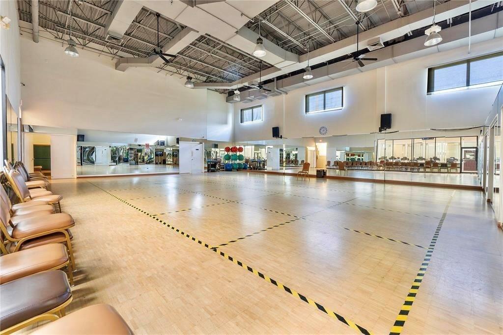 7763 Southampton Terrace, Unit 411 Tamarac, FL 33321 - Photo 27 of 33 a room with lots of dining table and chairs