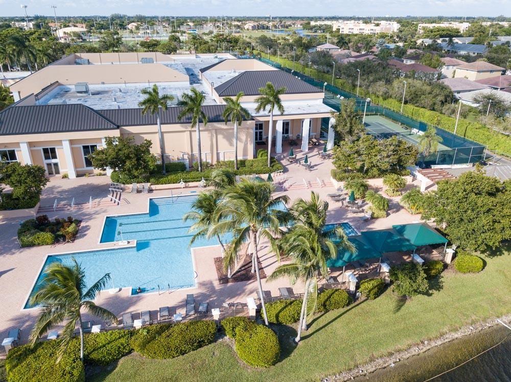 7763 Southampton Terrace, Unit 411 Tamarac, FL 33321 - Photo 30 of 33 an aerial view of residential houses with outdoor space and parking