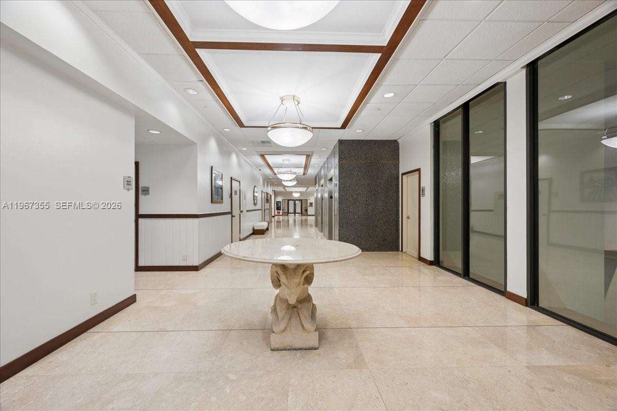 1915 Brickell Avenue, Unit 801 Miami, FL 33129 - Photo 31 of 37 a view of a hallway with seating area