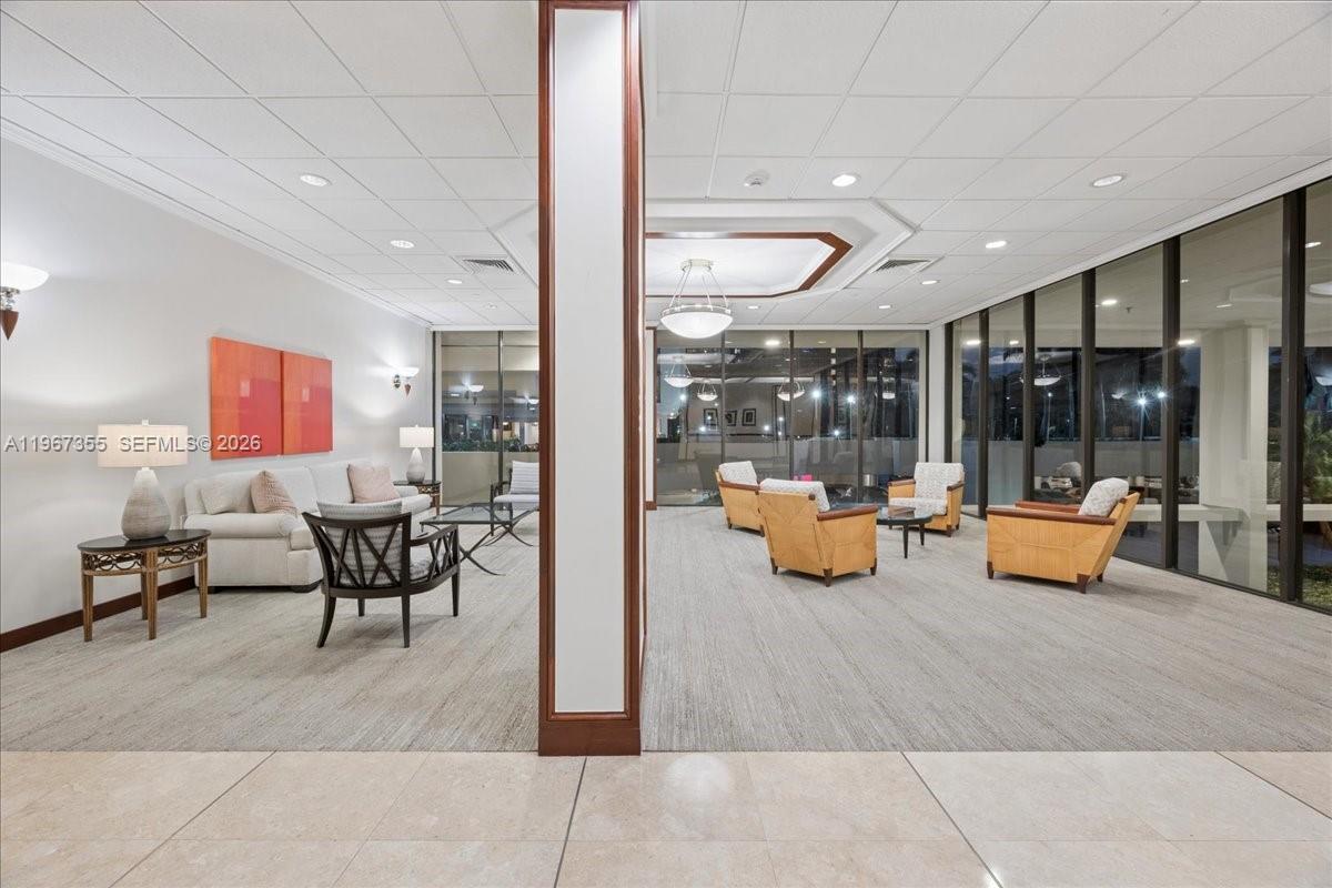1915 Brickell Avenue, Unit 801 Miami, FL 33129 - Photo 32 of 37 a lobby with furniture and rug