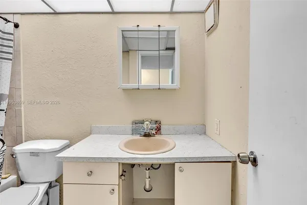 a view of a backyard of the house