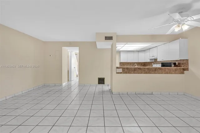 an aerial view of residential building with parking space