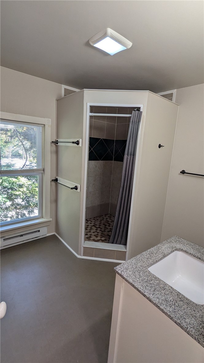 435 Main Street Oneonta, NY 13820 - Photo 21 of 38 Spacious custom tile shower in 2nd floor bathroom
