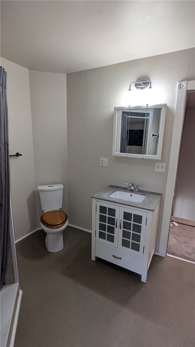 435 Main Street Oneonta, NY 13820 - Photo 22 of 38 Vanity, toilet, medicine cabinet in 2nd floor bath