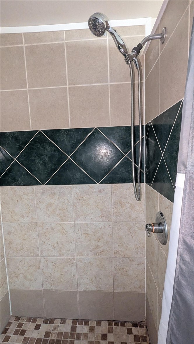 435 Main Street Oneonta, NY 13820 - Photo 23 of 38 Tile work in shower