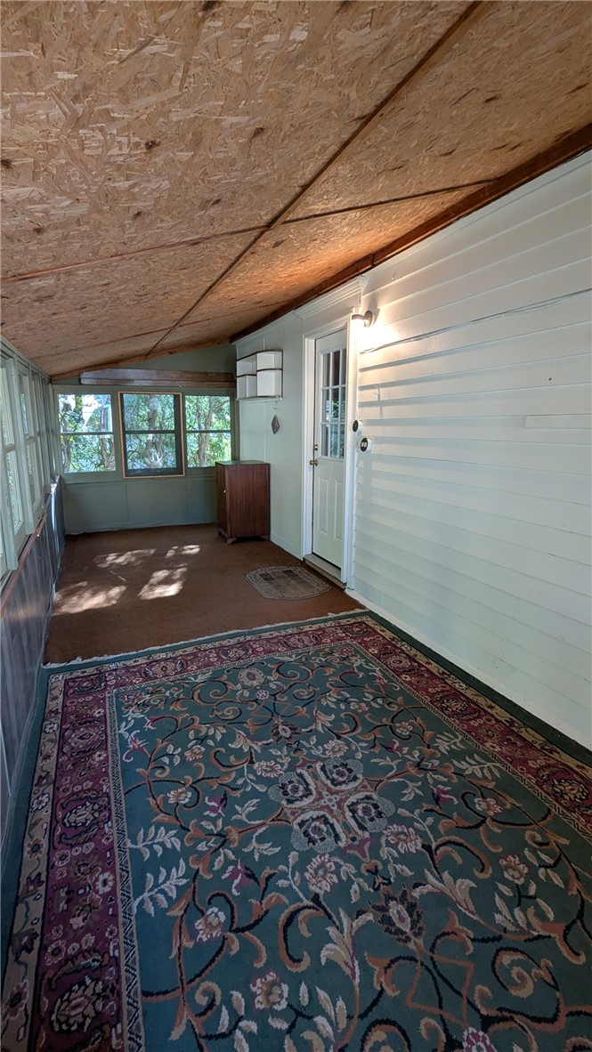 435 Main Street Oneonta, NY 13820 - Photo 30 of 38 Rear enclosed porch has entrance to kitchen