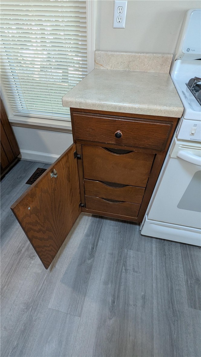 435 Main Street Oneonta, NY 13820 - Photo 7 of 38 Cabinets have storage drawers