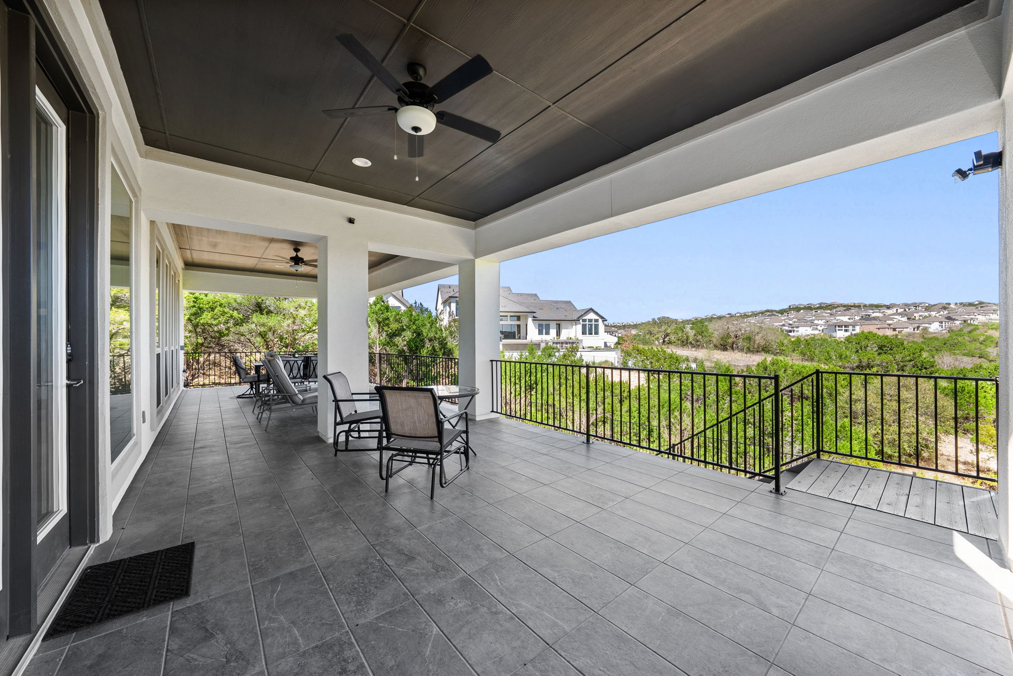 2132 Novara Trail Leander, TX 78641 - Photo 16 of 40 View of patio with ceiling fan, outdoor dining area, and a residential view