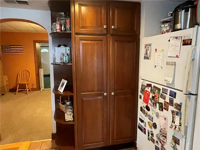 a bathroom with a sink mirror vanity and toilet