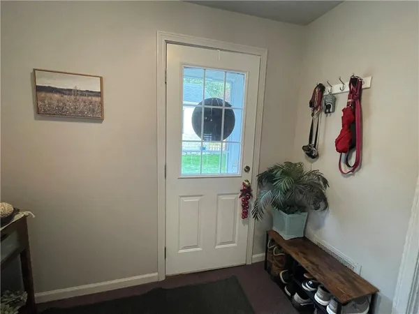 a bedroom with a bed and book shelf