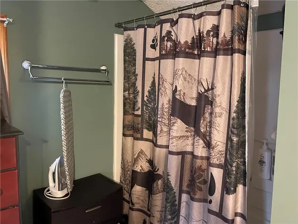 a house view with a sitting space and garden