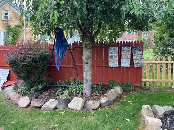 a view of a house with a back yard