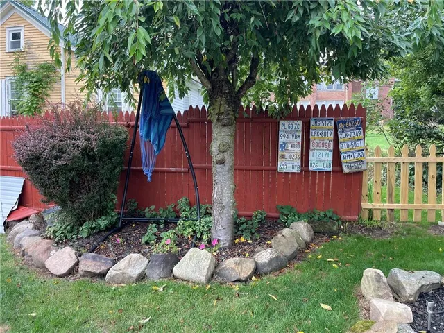 a view of a house with a back yard