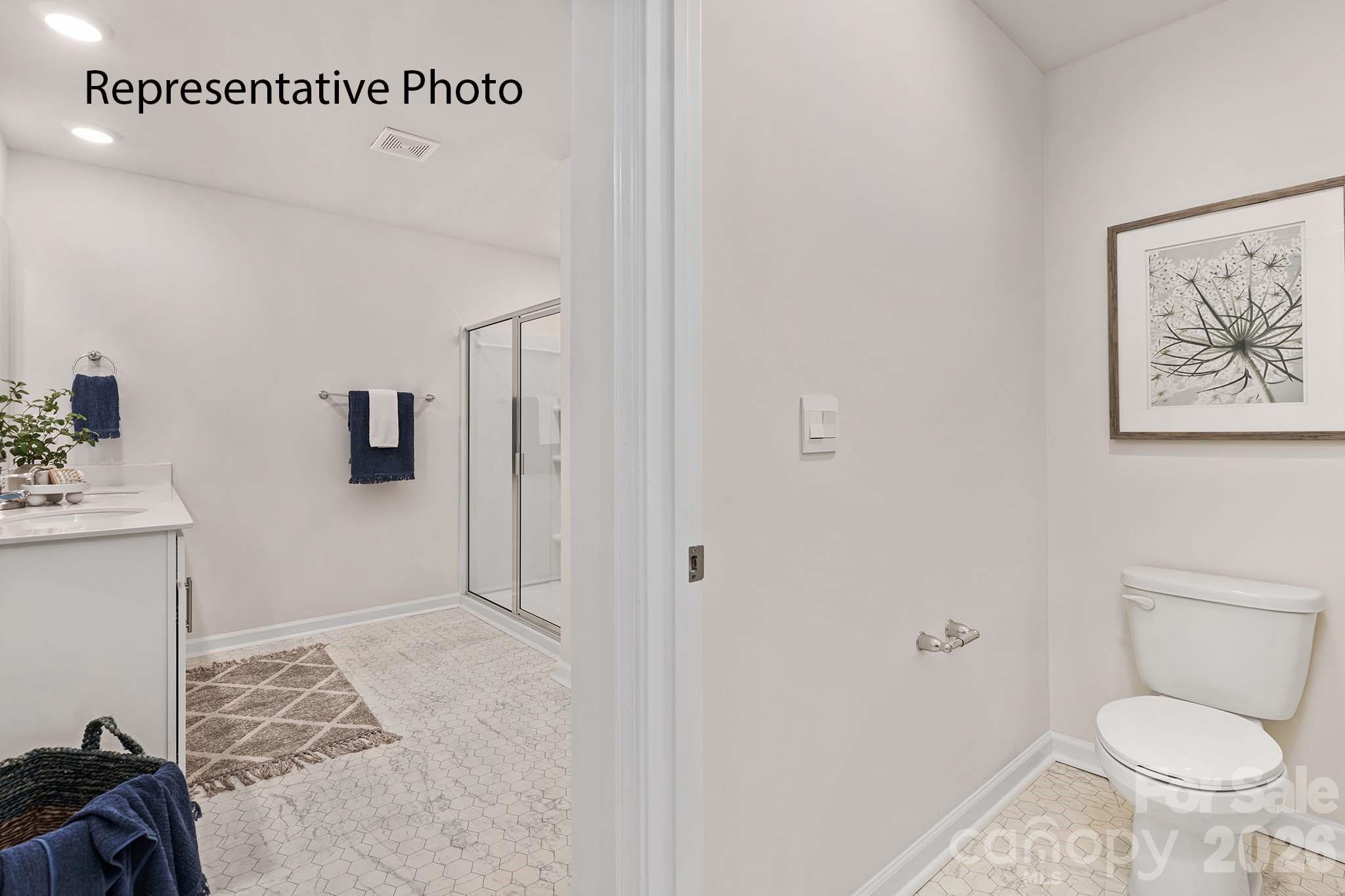 3647 Charles Street Northwest Conover, NC 28613 - Photo 20 of 21 a bathroom with a toilet and a sink