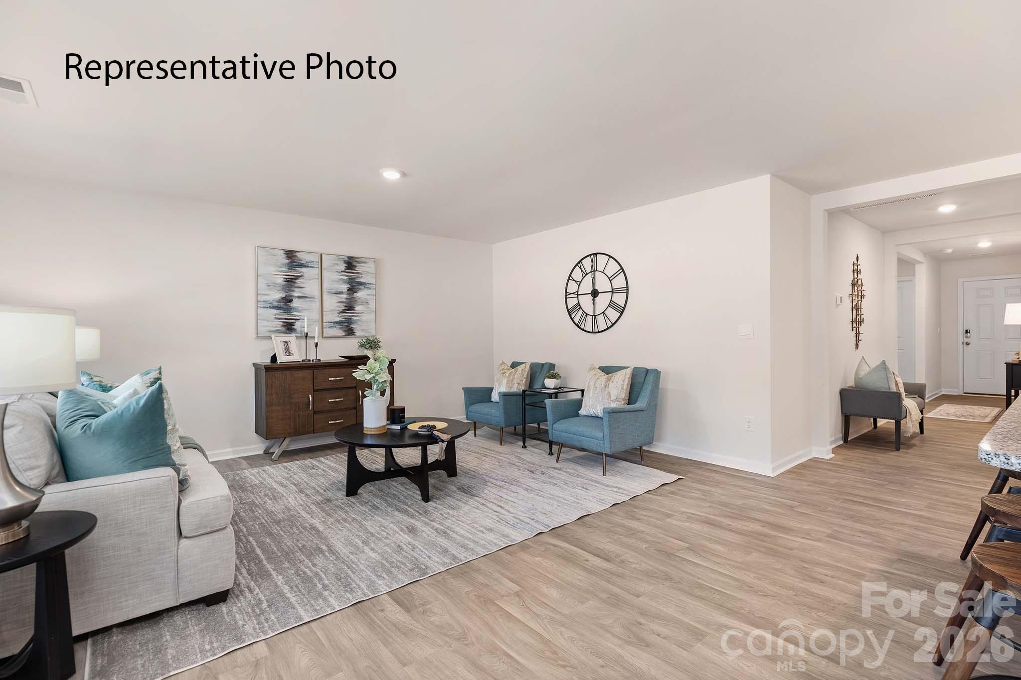 3647 Charles Street Northwest Conover, NC 28613 - Photo 2 of 21 a living room with furniture and a table