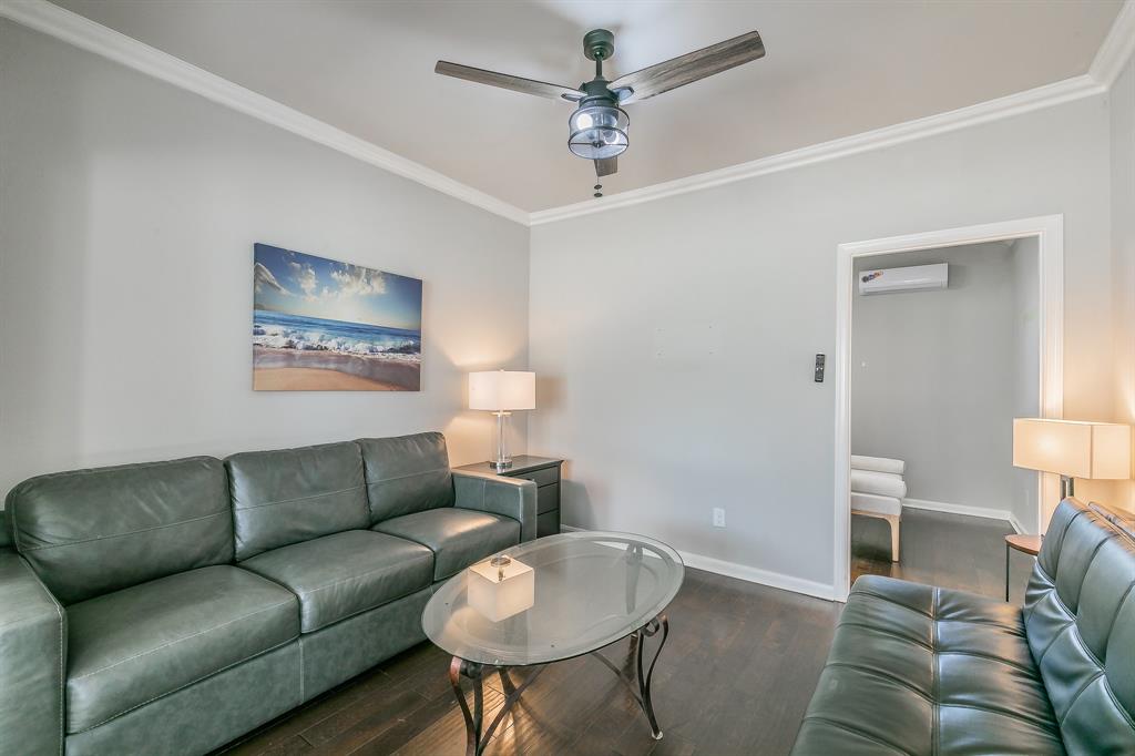 7612 Sommerville Place Road Fort Worth, TX 76135 - Photo 14 of 37 a living room with furniture a couch and a lamp