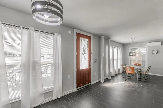 an empty room with windows