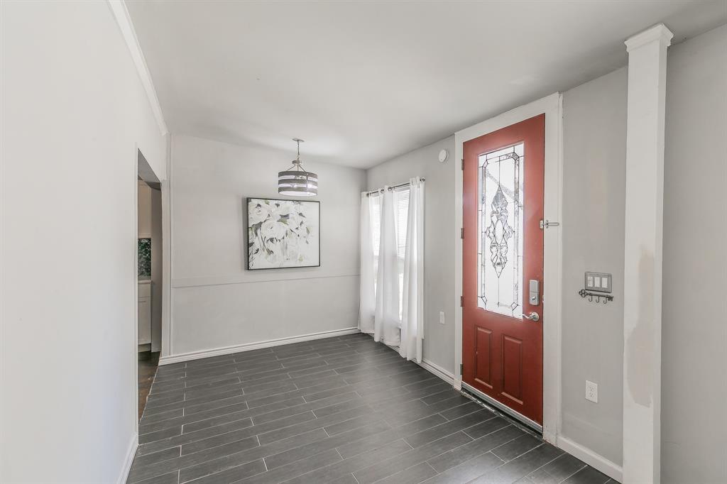 7612 Sommerville Place Road Fort Worth, TX 76135 - Photo 9 of 37 an empty room with windows