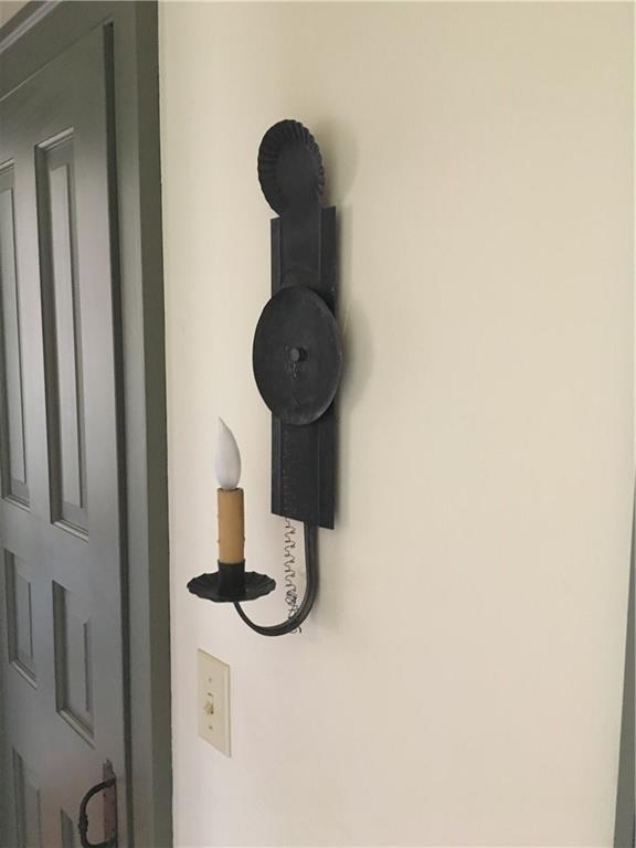 52 Cross Road Alna, ME 04535 - Photo 24 of 32 There are several sconces on the...
