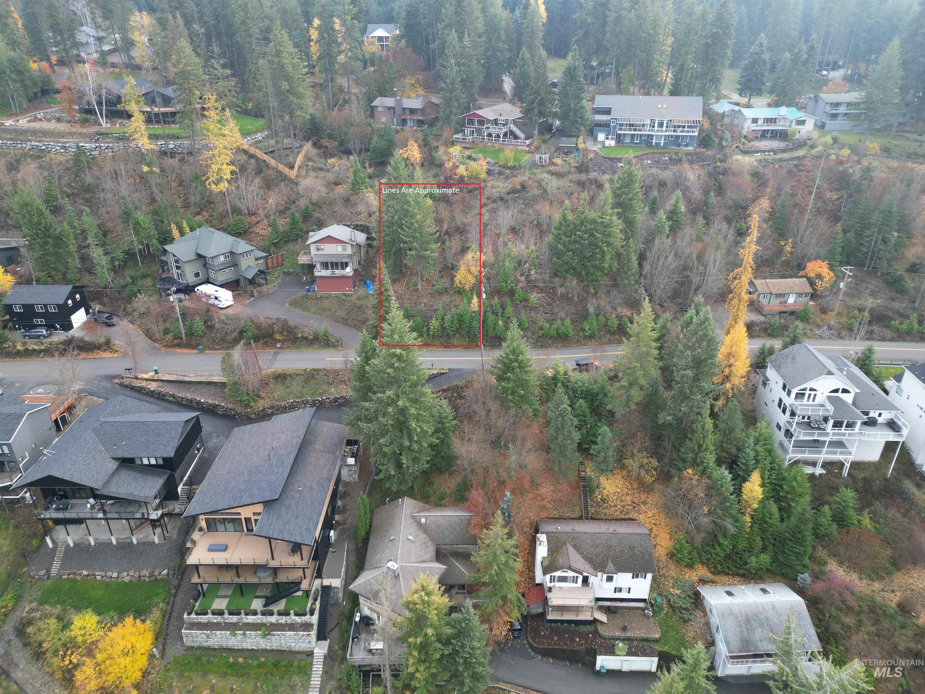 Nka East Upper Hayden Lake Road Hayden, ID 83835 - Photo 7 of 14 Aerial perspective of suburban area featuring property parcel outlined and a forest