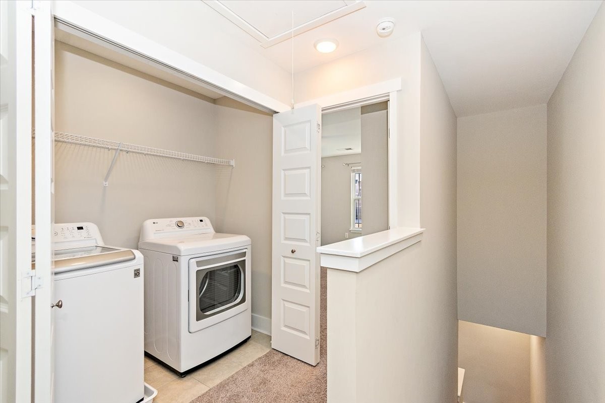 7000 Magnolia Crossings Spring Hill, TN 37174 - Photo 15 of 32 a utility room with dryer and washer
