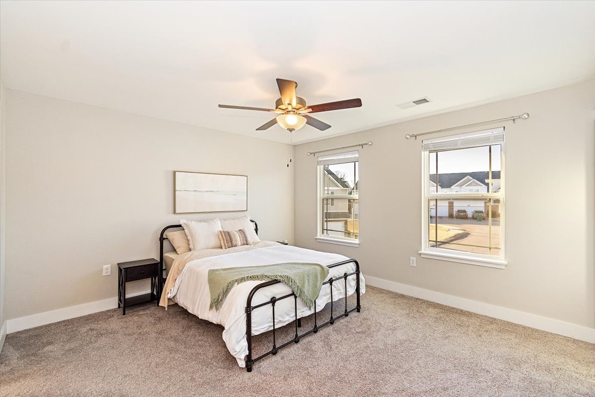 7000 Magnolia Crossings Spring Hill, TN 37174 - Photo 16 of 32 a bedroom with a bed and window