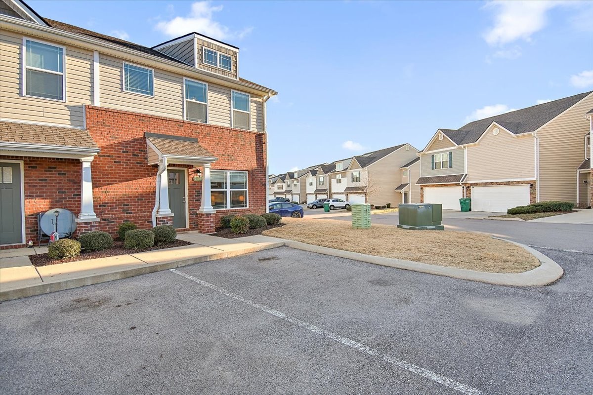 7000 Magnolia Crossings Spring Hill, TN 37174 - Photo 2 of 32 a view of a building with a street