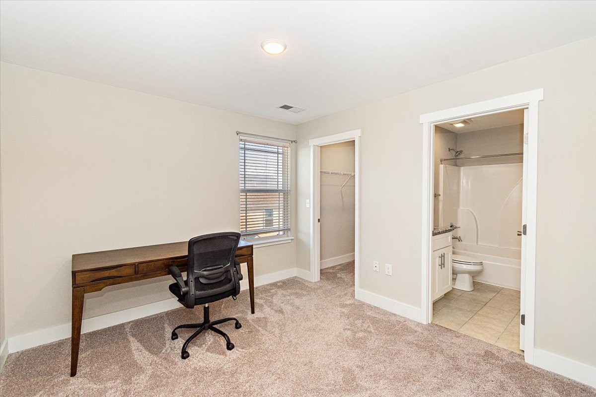 7000 Magnolia Crossings Spring Hill, TN 37174 - Photo 21 of 32 a view of a workspace with furniture and a window