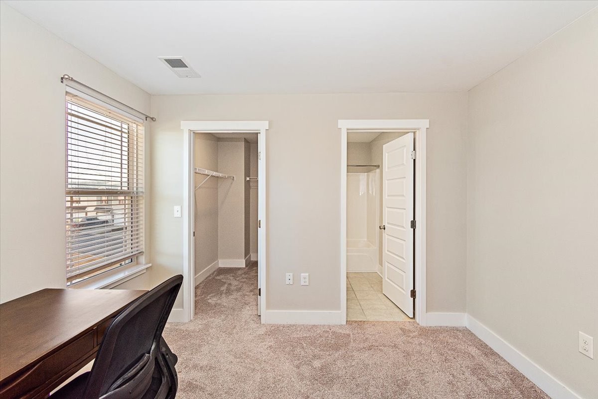 7000 Magnolia Crossings Spring Hill, TN 37174 - Photo 22 of 32 an empty room with windows