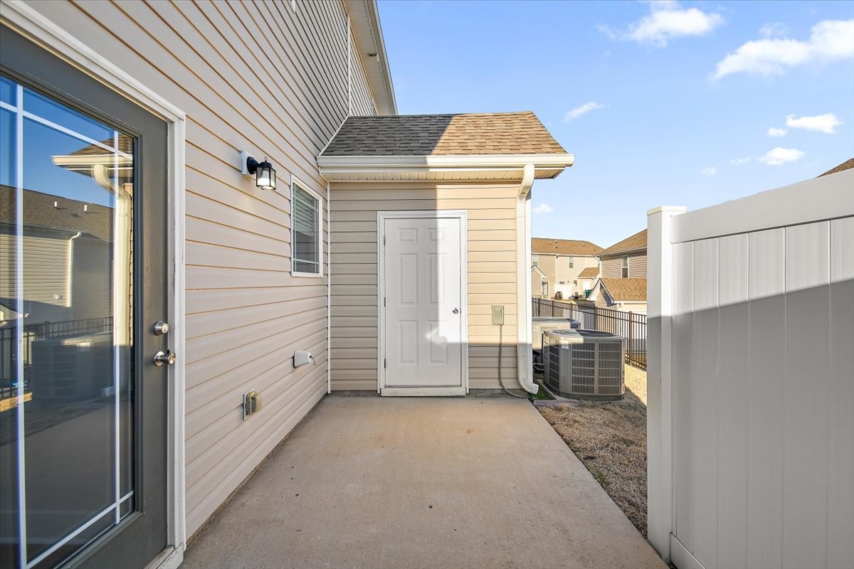 7000 Magnolia Crossings Spring Hill, TN 37174 - Photo 24 of 32 a front view of a house with a yard