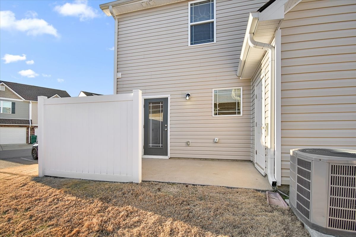 7000 Magnolia Crossings Spring Hill, TN 37174 - Photo 25 of 32 a view of a house with a wooden fence
