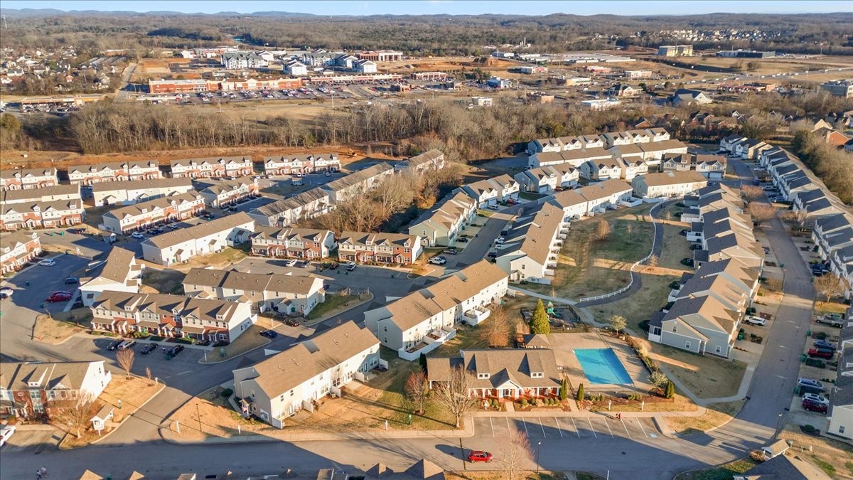 7000 Magnolia Crossings Spring Hill, TN 37174 - Photo 28 of 32 an aerial view of a city with lots of residential buildings