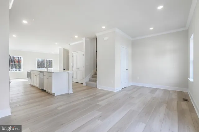 a view of kitchen with wooden floor
