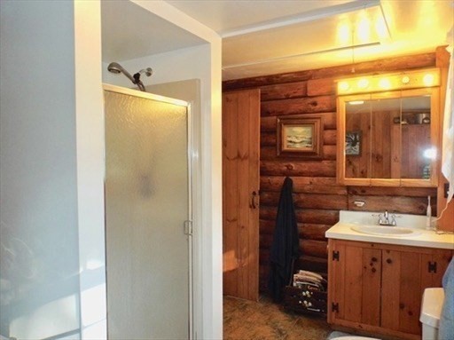 42 Shelburne Line Road Colrain, MA 01340 - Photo 18 of 41 a bathroom with a sink and a mirror