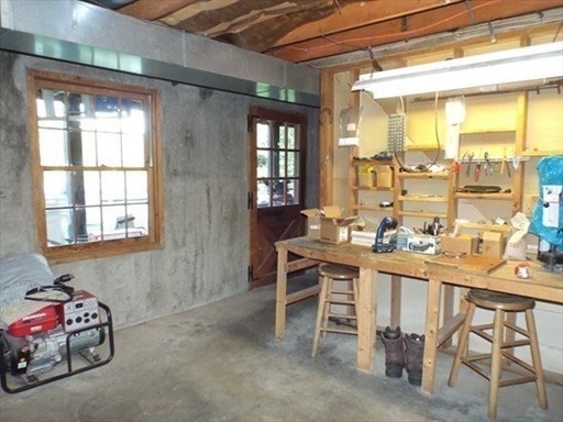 42 Shelburne Line Road Colrain, MA 01340 - Photo 20 of 41 a dining room with a table and chairs