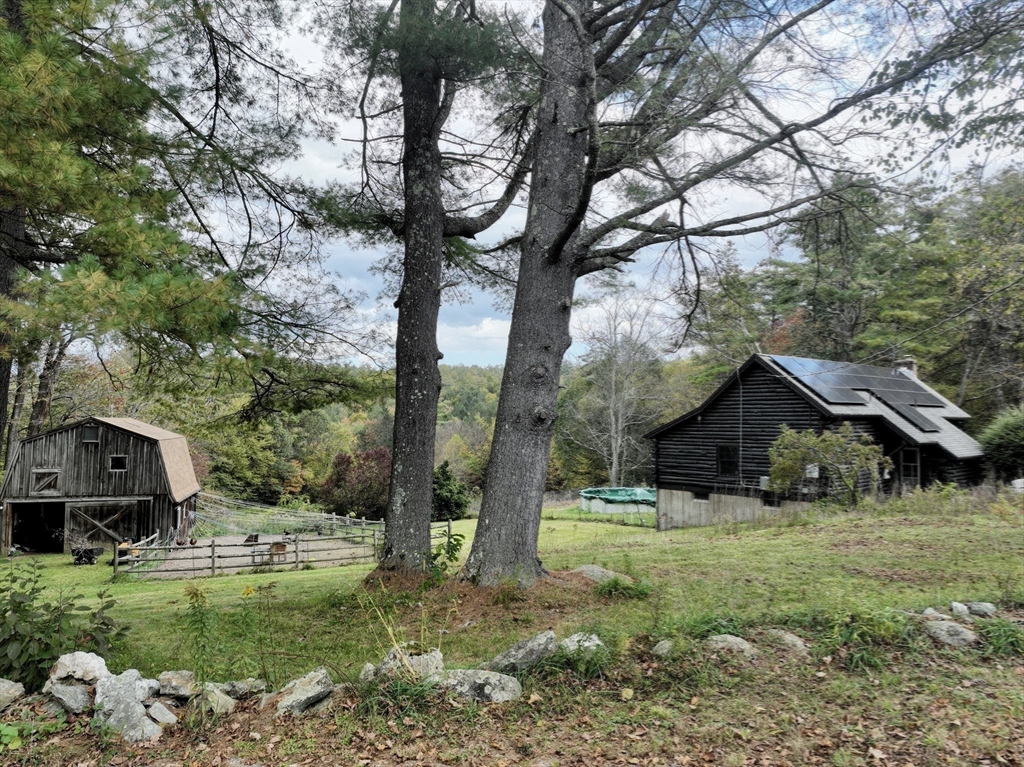 42 Shelburne Line Road Colrain, MA 01340 - Photo 22 of 41 a view of a house with a yard