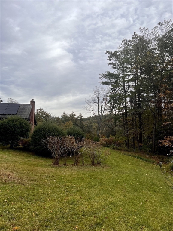 42 Shelburne Line Road Colrain, MA 01340 - Photo 36 of 41 a view of a lake with houses in the back