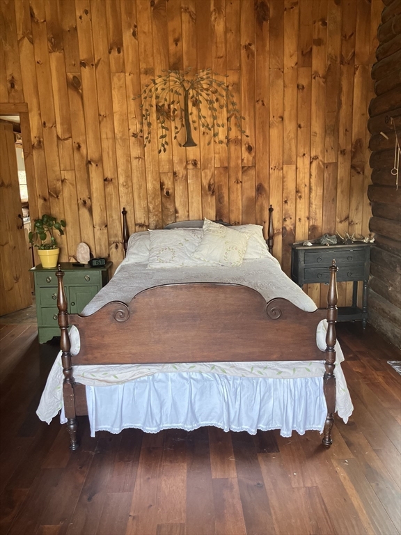 42 Shelburne Line Road Colrain, MA 01340 - Photo 7 of 41 a bedroom with a bed and wooden floor