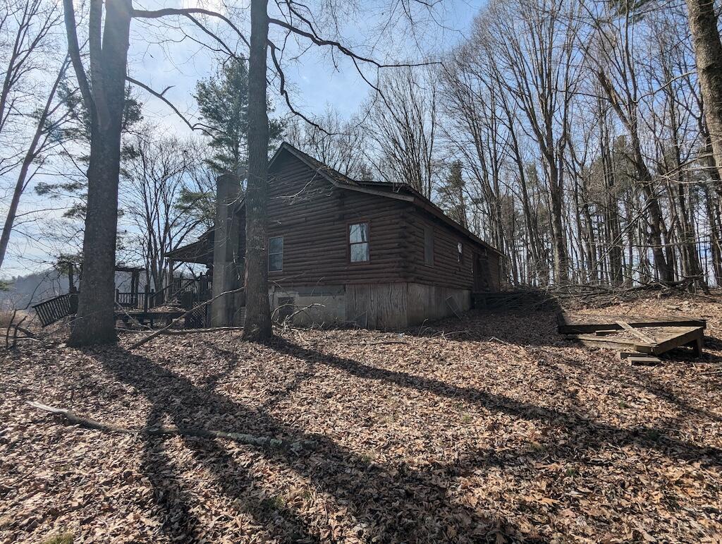 1704 Coles Knob Road Northeast Pilot, VA 24138 - Photo 4 of 10 a backyard of a house with lots of green space