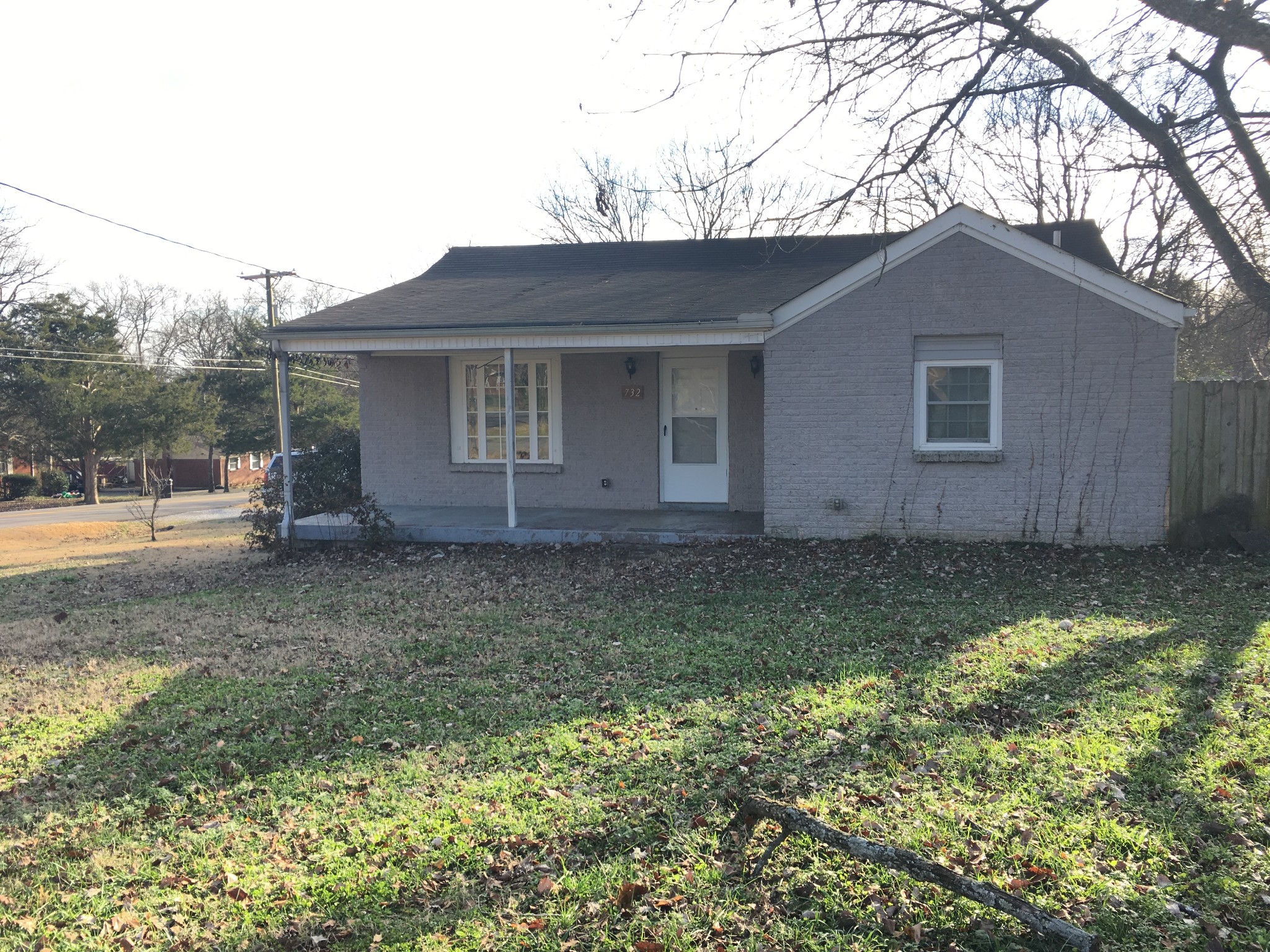 a house view with a backyard space