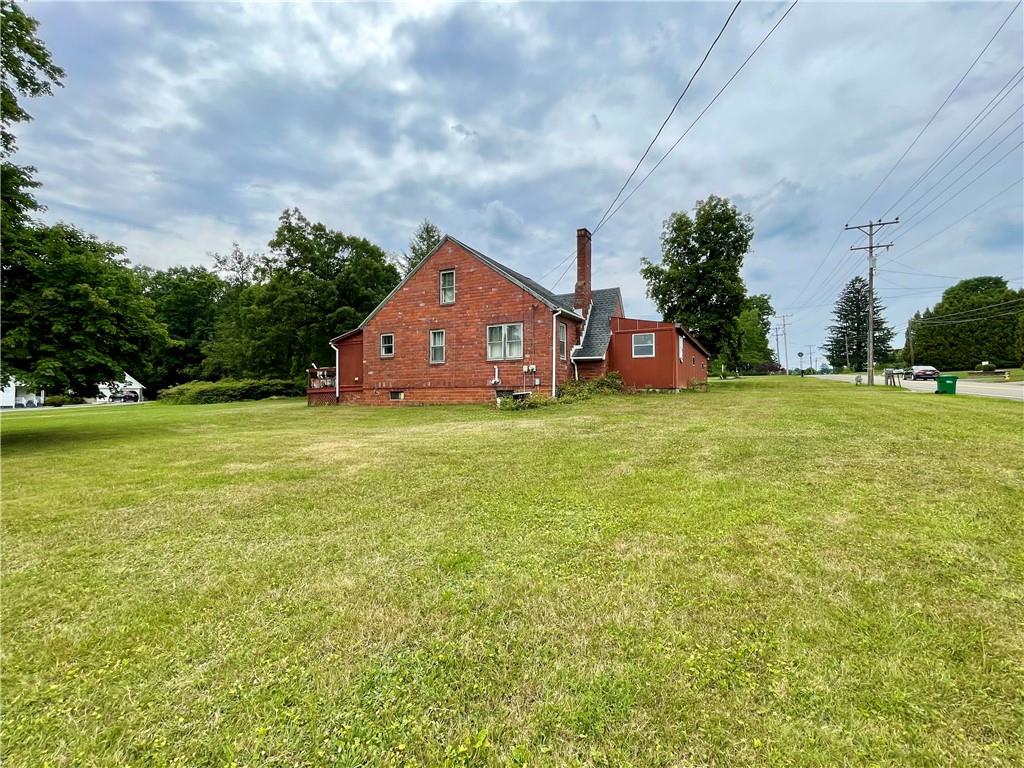 453 Whitestown Road Butler, PA 16001 - Photo 14 of 16 a big house with a big yard and large trees