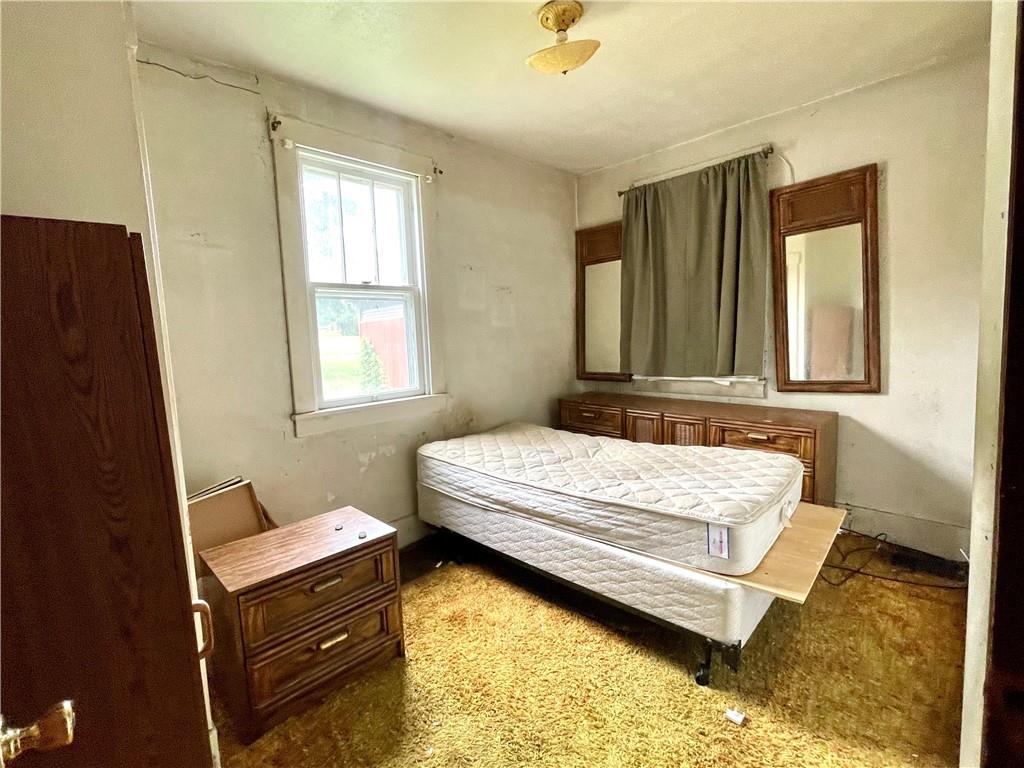 453 Whitestown Road Butler, PA 16001 - Photo 8 of 16 a bedroom with a bed and window