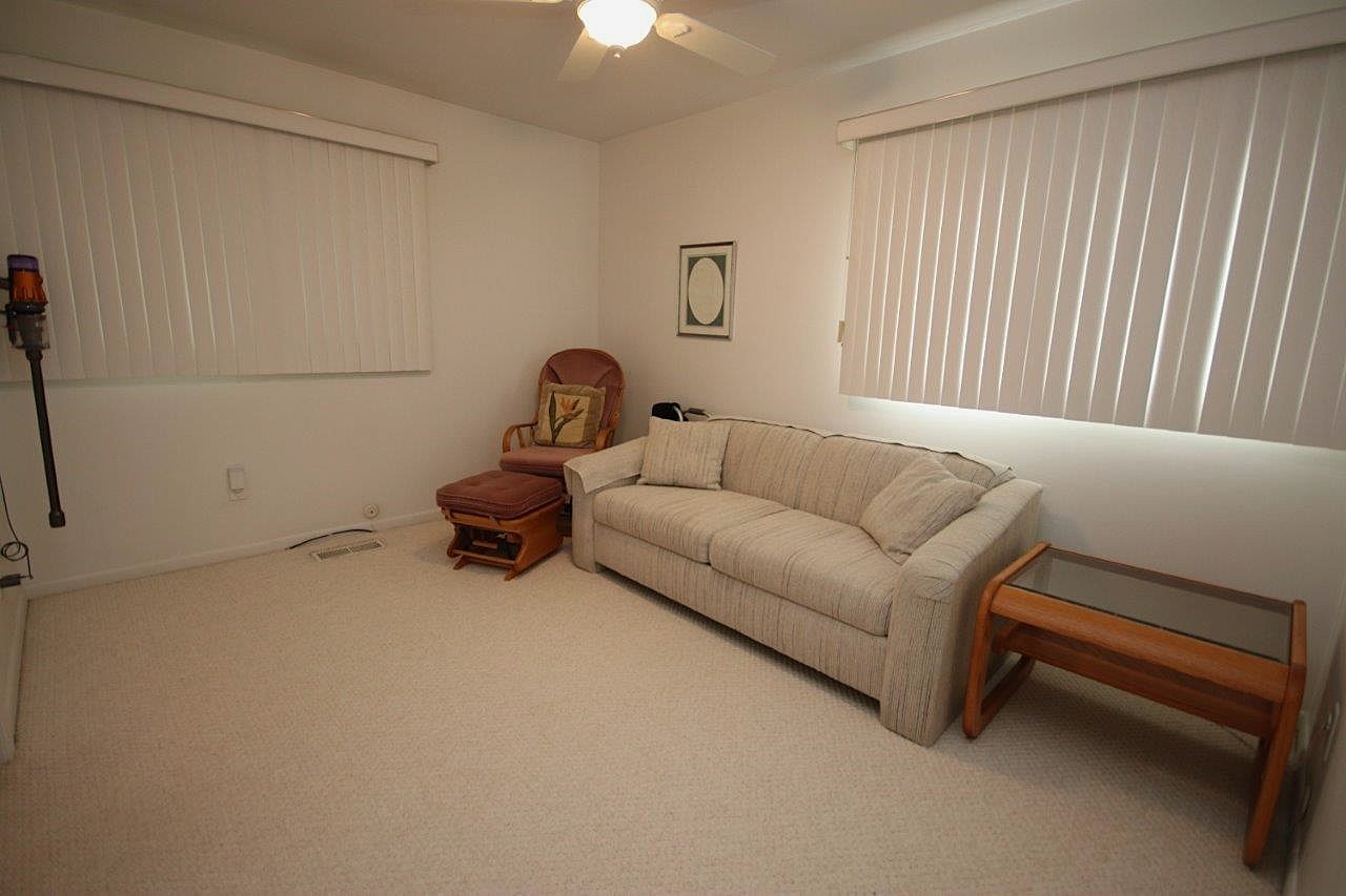 209 Gladys Avenue Fox River Grove, IL 60021 - Photo 13 of 23 a living room with furniture and a window